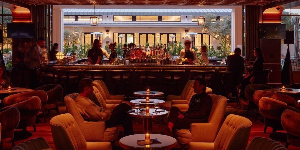 Guests at the Lobby Bar, The Global Ambassador